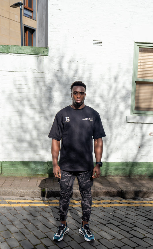 TBB TEE: OVERSIZED BACK LOGO