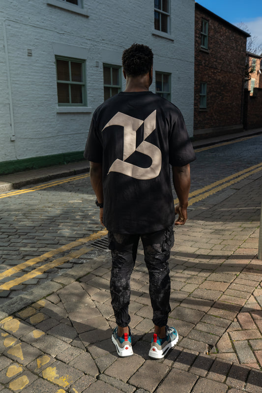 TBB TEE: OVERSIZED BACK LOGO